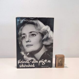 Kvinde - din pligt er skønhed af Sven Holm